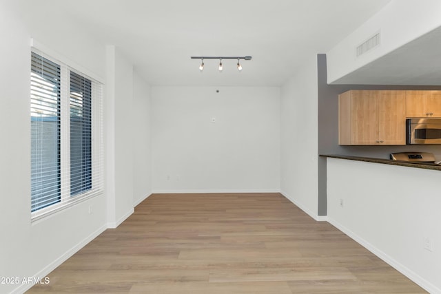 interior space featuring light wood-type flooring