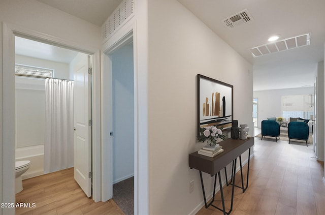 1213 N 13th St, Coolidge, AZ 85128 - hallway featuring recessed lighting, light wood-style flooring, and visible vents
