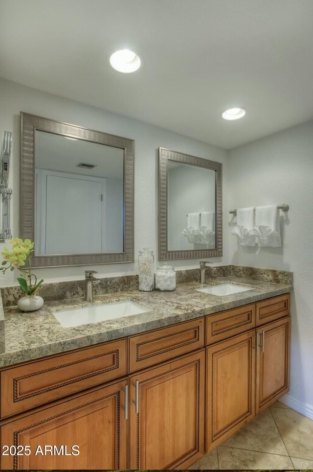 bathroom with vanity and tile patterned floors