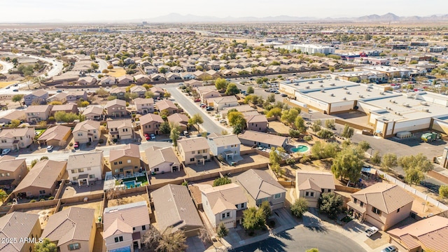 birds eye view of property with a mountain view