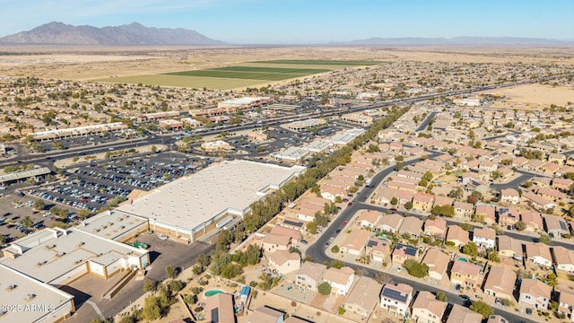 birds eye view of property featuring a mountain view