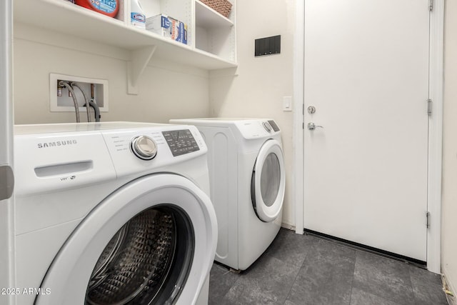 laundry room with independent washer and dryer