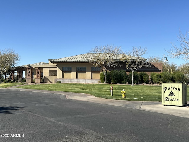 view of front of home with a front yard