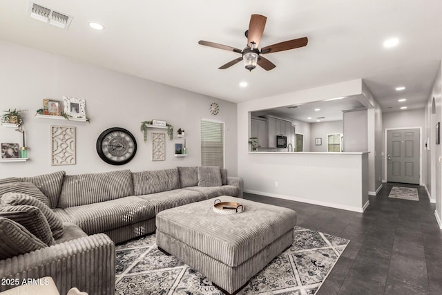 living room with ceiling fan