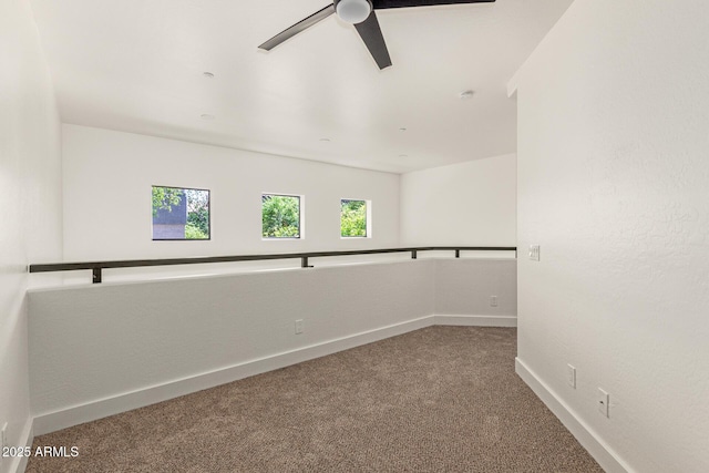 2019 E Campbell Ave Unit 110, Phoenix, AZ 85016 - carpeted empty room with a ceiling fan and baseboards