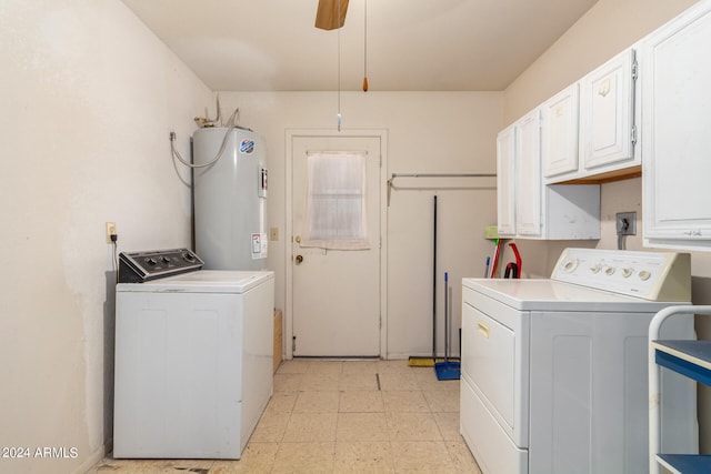 laundry room featuring ceiling fan, electric water heater, cabinets, and washer and dryer