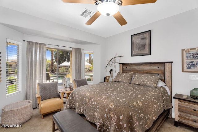 bedroom with light tile patterned floors, visible vents, ceiling fan, and access to outside