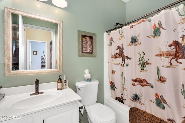 bathroom with vanity, toilet, and shower / bath combo