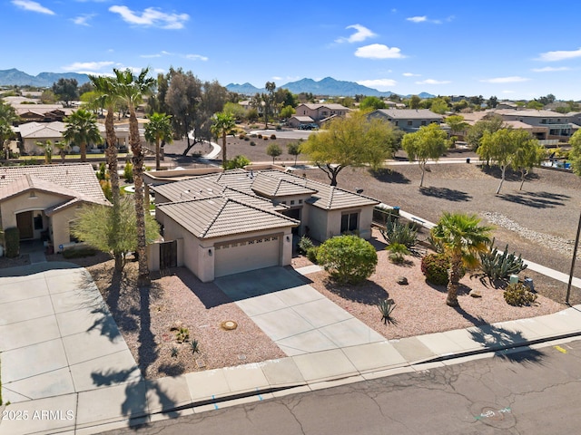 bird's eye view with a mountain view and a residential view