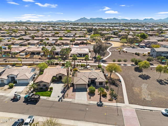 drone / aerial view with a mountain view and a residential view