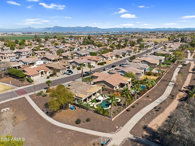 drone / aerial view with a mountain view and a residential view