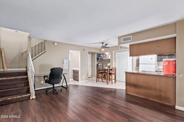 office area featuring ceiling fan and dark wood-type flooring