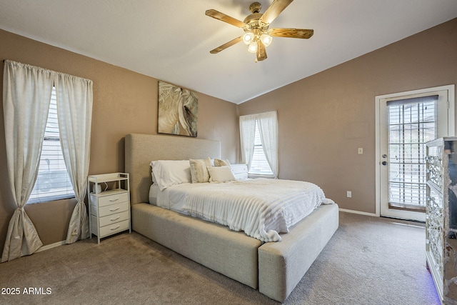 bedroom featuring baseboards, ceiling fan, access to outside, vaulted ceiling, and carpet flooring