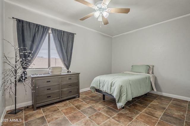 bedroom featuring ceiling fan, ornamental molding, and baseboards