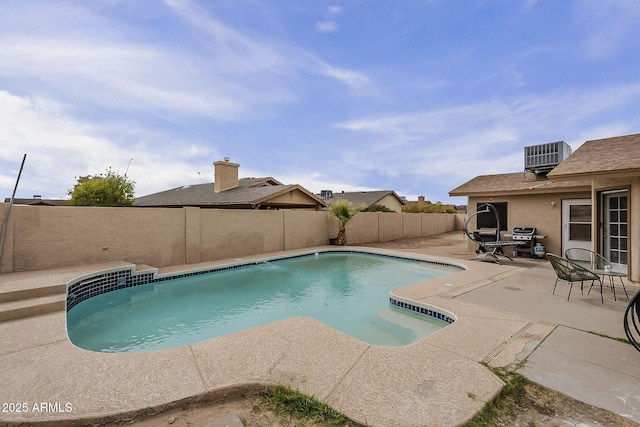 view of pool featuring central air condition unit, a patio area, a fenced backyard, and a fenced in pool