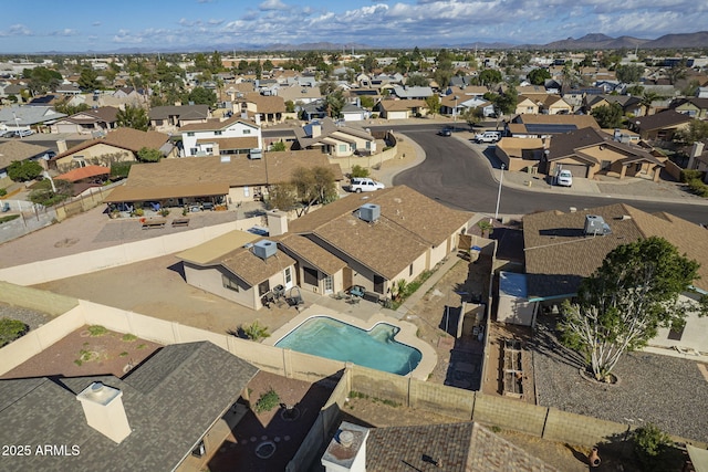 drone / aerial view with a mountain view and a residential view