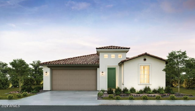 mediterranean / spanish-style home featuring a garage