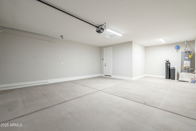 garage with a garage door opener and water heater