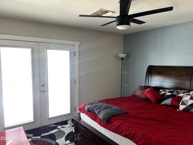 bedroom featuring french doors and ceiling fan