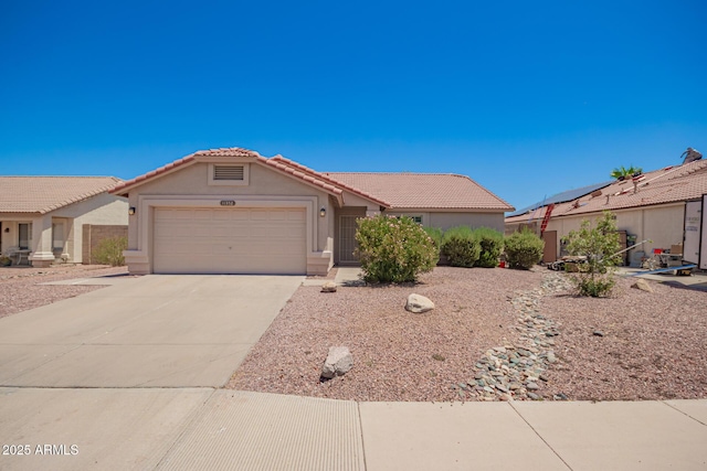 11352 E Dartmouth St, Mesa, AZ 85207 - ranch-style home featuring a tile roof, stucco siding, a garage, and driveway