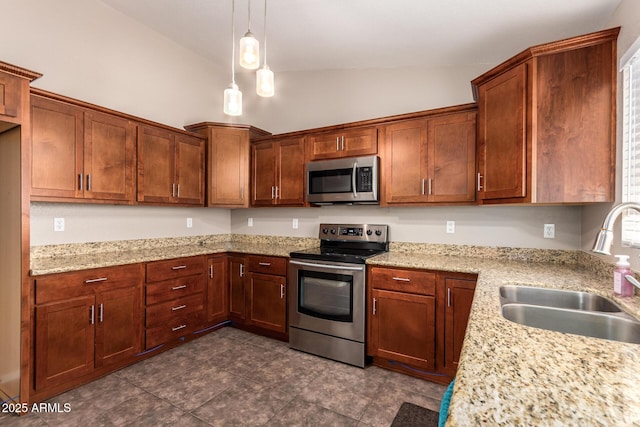 11352 E Dartmouth St, Mesa, AZ 85207 - kitchen featuring stainless steel appliances, lofted ceiling, pendant lighting, light stone countertops, and dark tile patterned floors