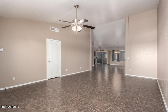 11352 E Dartmouth St, Mesa, AZ 85207 - unfurnished living room featuring ceiling fan, high vaulted ceiling, and dark tile patterned floors