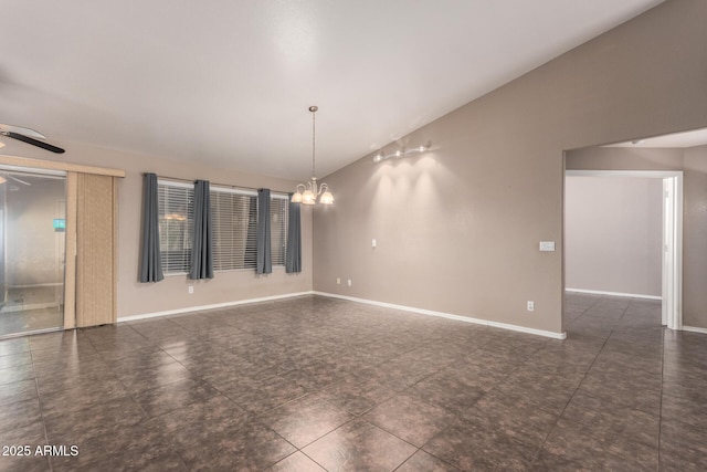 11352 E Dartmouth St, Mesa, AZ 85207 - empty room featuring vaulted ceiling, a chandelier, and a ceiling fan