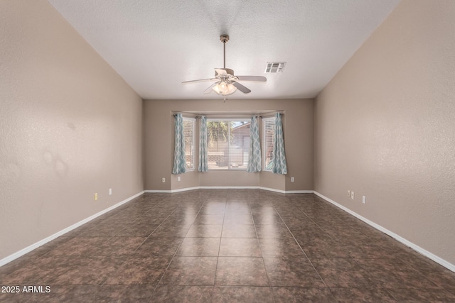11352 E Dartmouth St, Mesa, AZ 85207 - tiled spare room featuring ceiling fan and baseboards