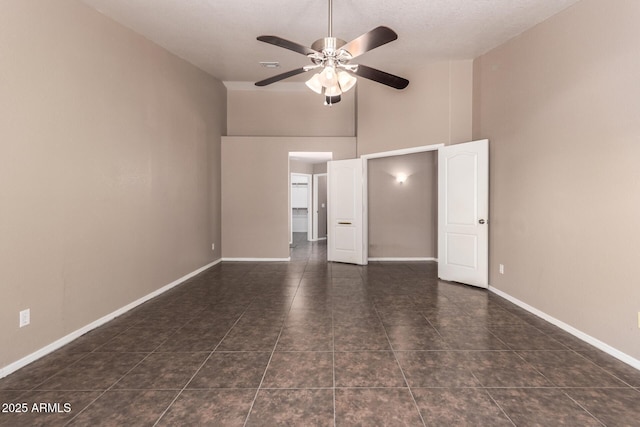 11352 E Dartmouth St, Mesa, AZ 85207 - unfurnished bedroom featuring high vaulted ceiling, tile patterned flooring, and a ceiling fan
