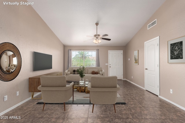 11352 E Dartmouth St, Mesa, AZ 85207 - living area with lofted ceiling, ceiling fan, and dark tile patterned flooring