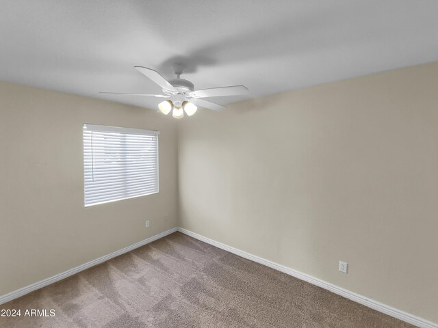 full bathroom with tile patterned floors, tiled shower / bath combo, vanity, and toilet