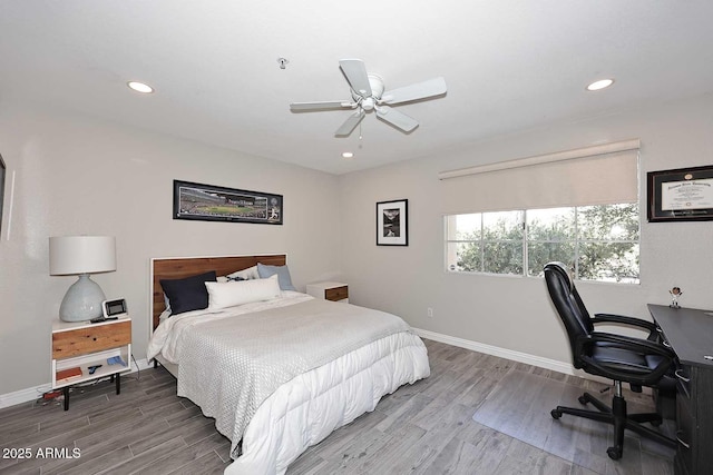 bedroom featuring recessed lighting, baseboards, and wood finished floors