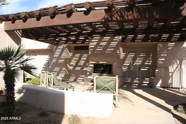 view of patio featuring a pergola