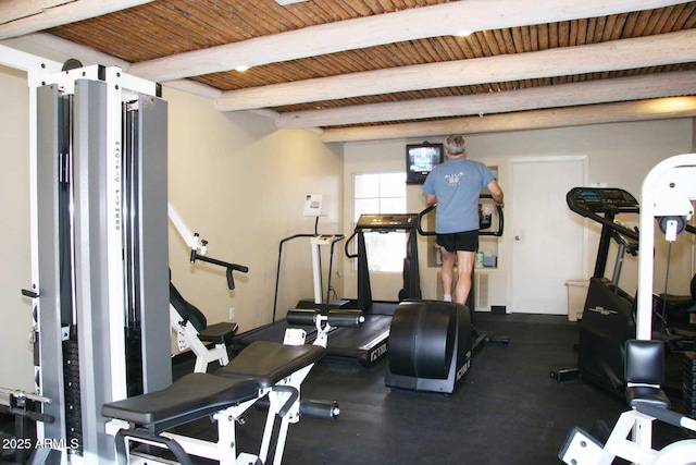 exercise area with wood ceiling