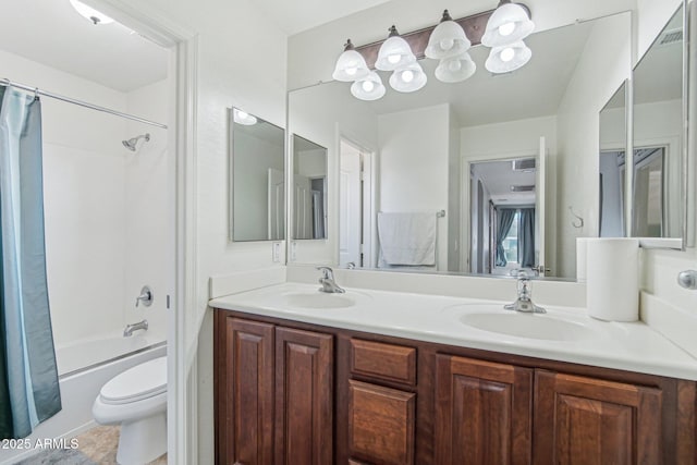 bathroom featuring double vanity, a sink, toilet, and shower / bathtub combination with curtain