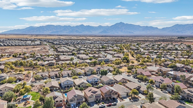 birds eye view of property featuring a mountain view and a residential view