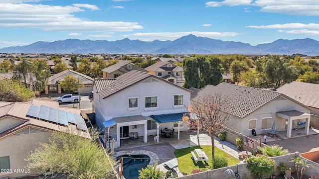 bird's eye view with a residential view and a mountain view