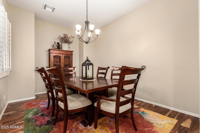 2554 E Honeysuckle Pl, Chandler, AZ 85286 - dining room with wood finished floors and a chandelier