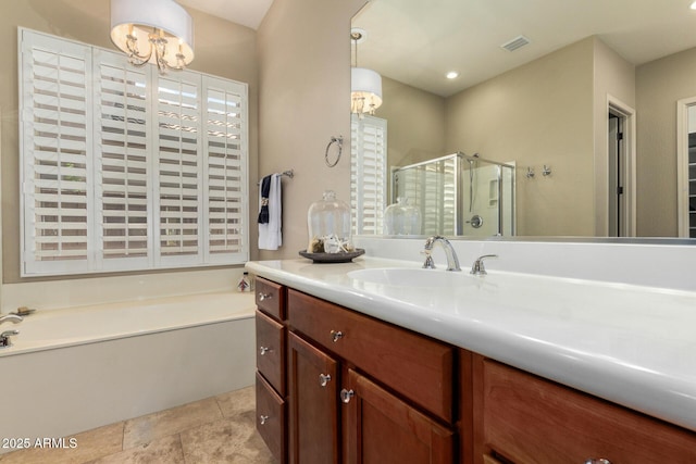 2554 E Honeysuckle Pl, Chandler, AZ 85286 - bathroom featuring vanity, a stall shower, a bath, and a chandelier