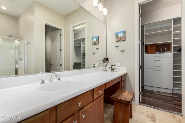 2554 E Honeysuckle Pl, Chandler, AZ 85286 - full bath featuring a walk in closet, vanity, and a stall shower
