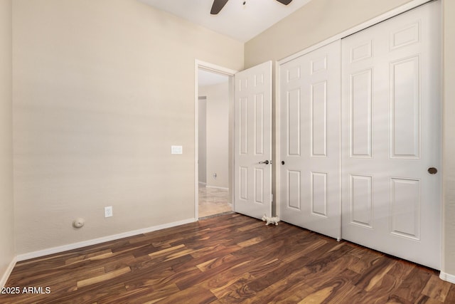 2554 E Honeysuckle Pl, Chandler, AZ 85286 - unfurnished bedroom featuring dark wood finished floors, a closet, and ceiling fan