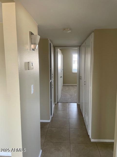 corridor with tile patterned floors