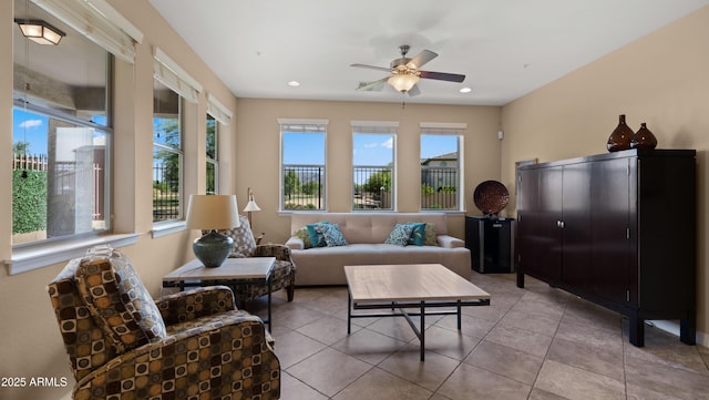 tiled living area with plenty of natural light, ceiling fan, and recessed lighting