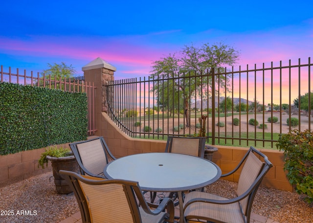 view of patio / terrace with fence and outdoor dining area