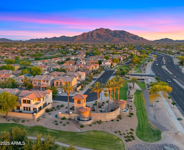 aerial perspective of suburban area featuring a mountainous background