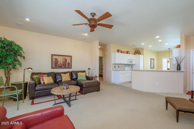 19607 N Flint Way, Surprise, AZ 85374 - living area with light carpet, ceiling fan, and recessed lighting