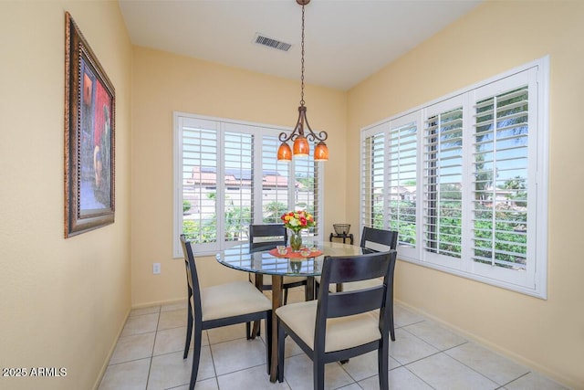 19607 N Flint Way, Surprise, AZ 85374 - dining area with a chandelier, healthy amount of natural light, and baseboards