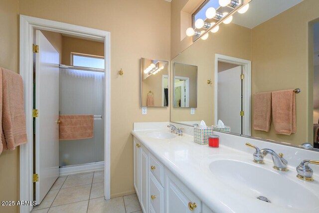 19607 N Flint Way, Surprise, AZ 85374 - bathroom featuring double vanity, tile patterned floors, and baseboards
