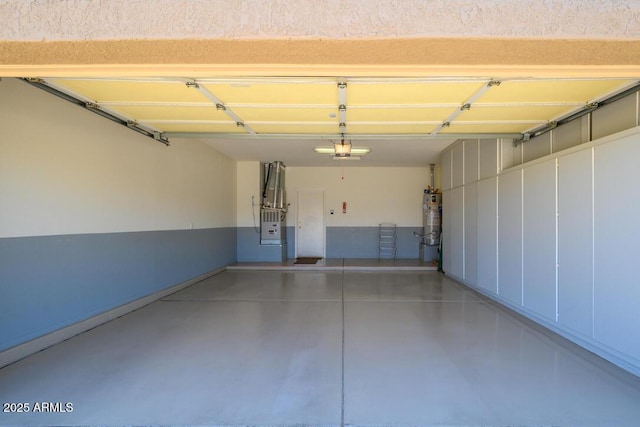 19607 N Flint Way, Surprise, AZ 85374 - garage featuring secured water heater and a garage door opener