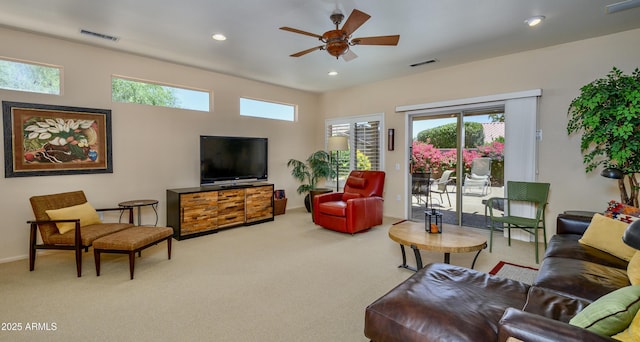 19607 N Flint Way, Surprise, AZ 85374 - living area featuring carpet floors, ceiling fan, healthy amount of natural light, and recessed lighting